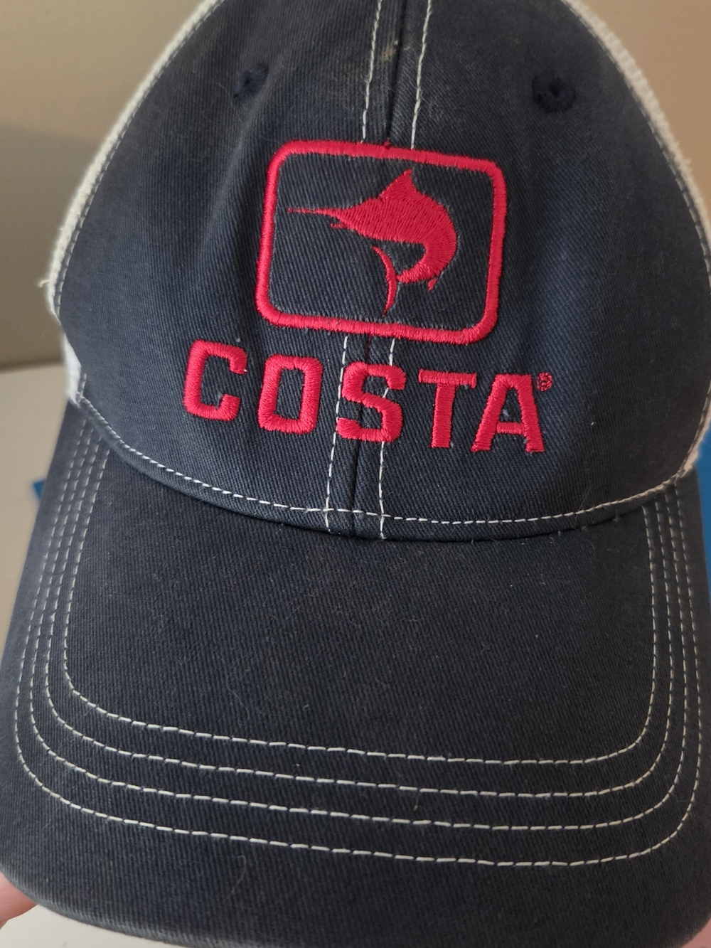 Costa Men's Navy Trucker Cap with Red Logo